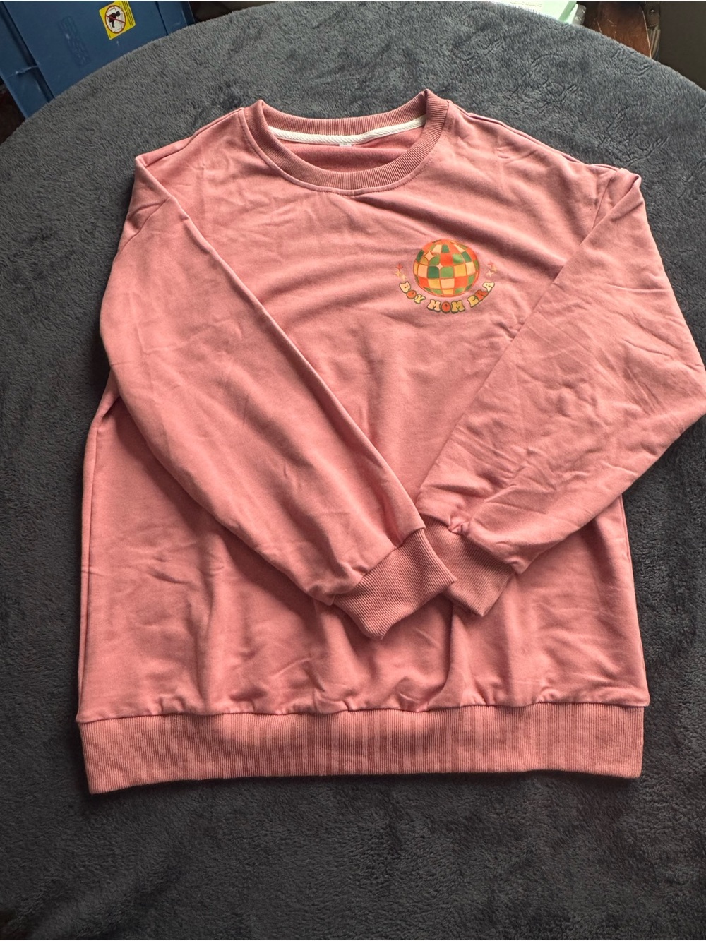 Pink Graphic Crewneck Sweatshirt with Colorful Globe Logo